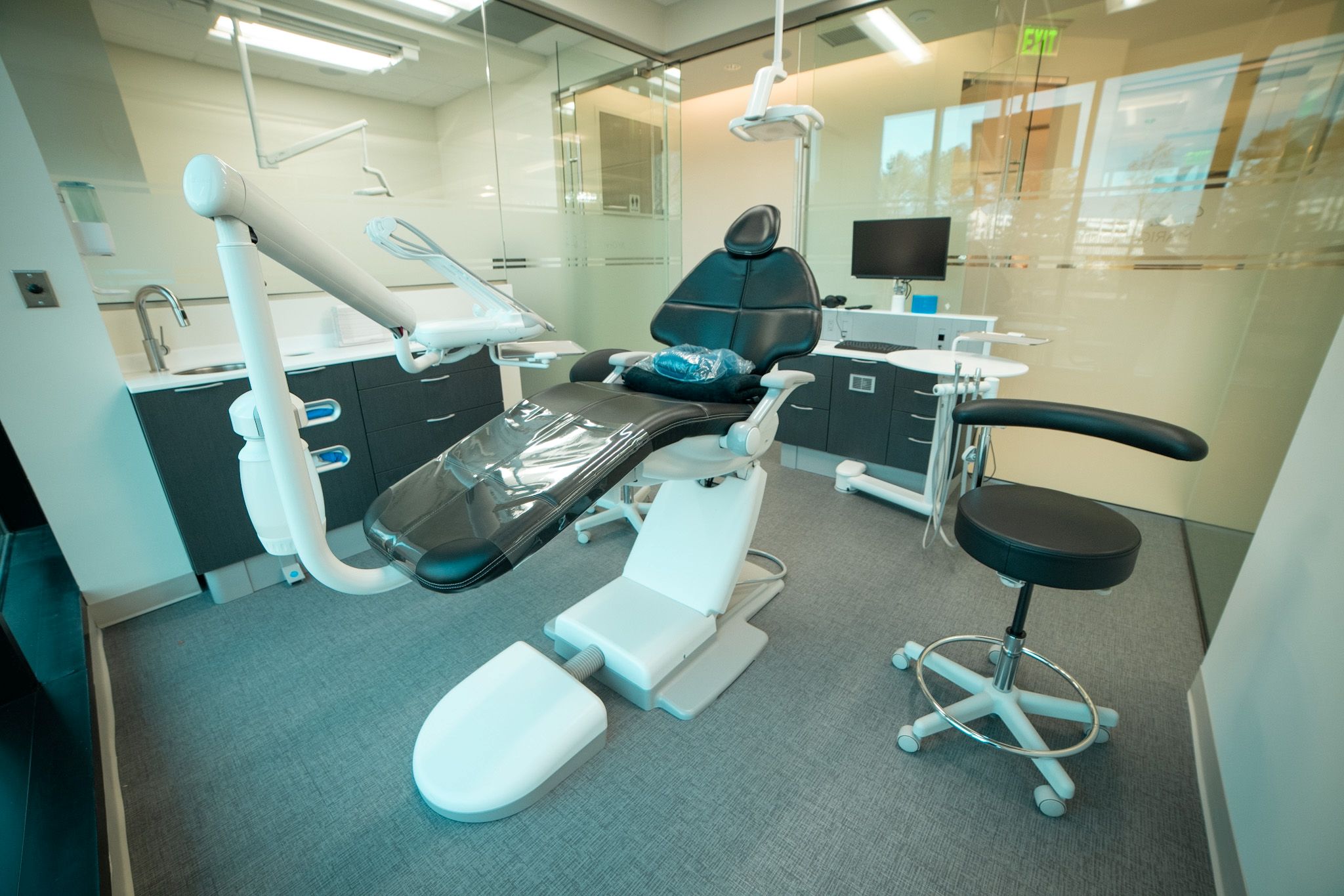 Modern dental operatory at Smiles by Mario Montoya in Sandy Springs, GA, featuring dental chairs and equipment