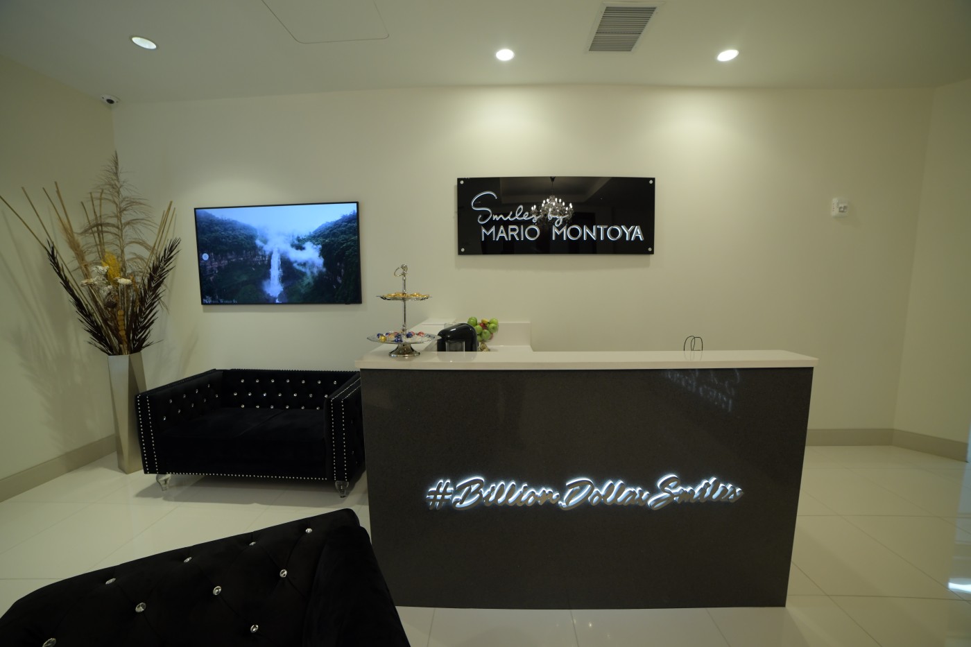 Modern reception and waiting area at Smiles by Mario Montoya dental office in Sandy Springs, GA